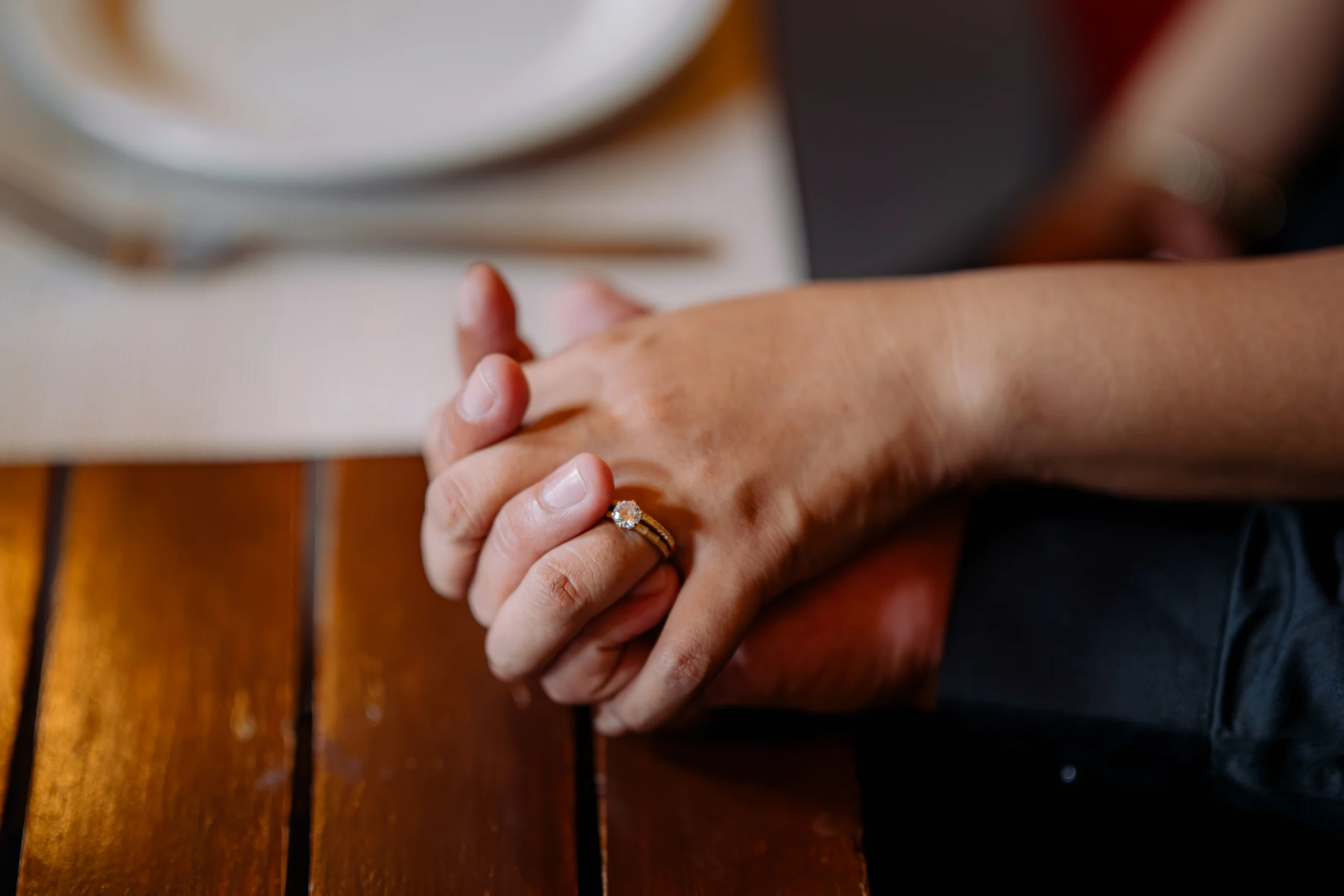 Anne’s engagement ring as Ryan and Anne hold hands.